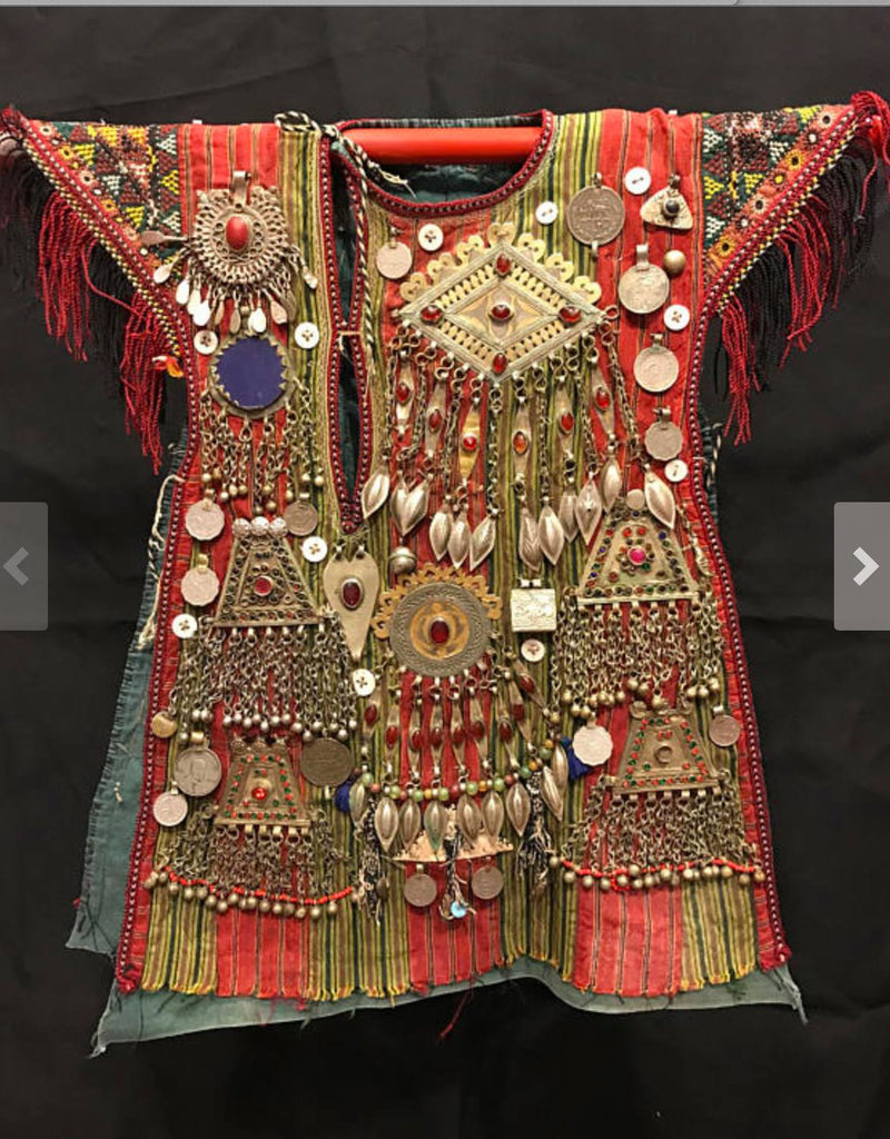 How about this amazing child's ceremonial tunic from Uzbekistan! Fabulous textile art!